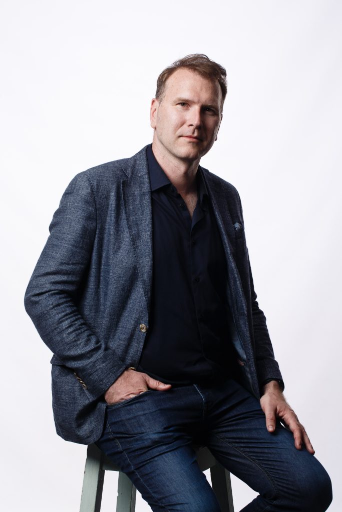 Casual business portrait sitting on a chair
